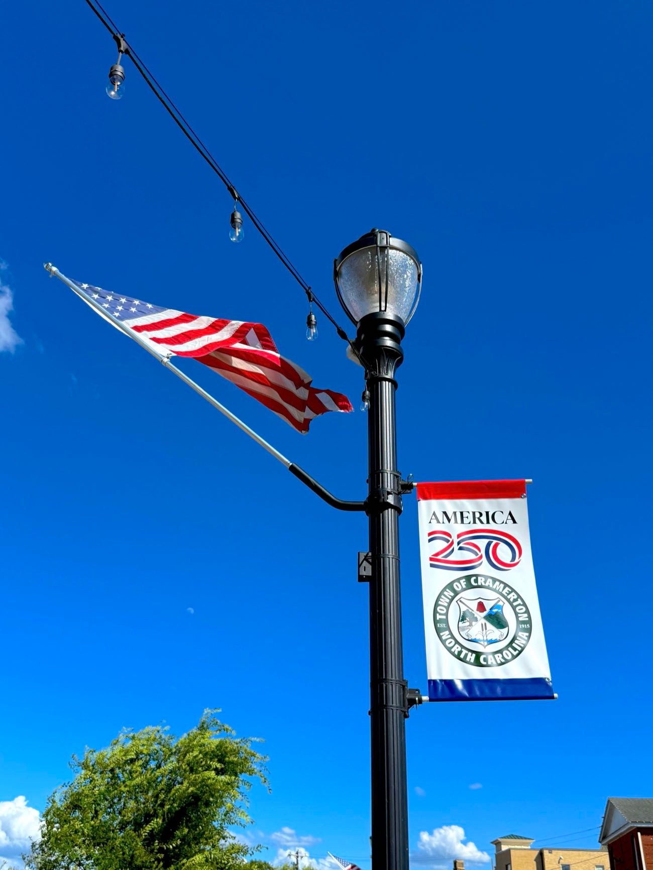 America 250 community celebration banner in downtown Cramerton, NC