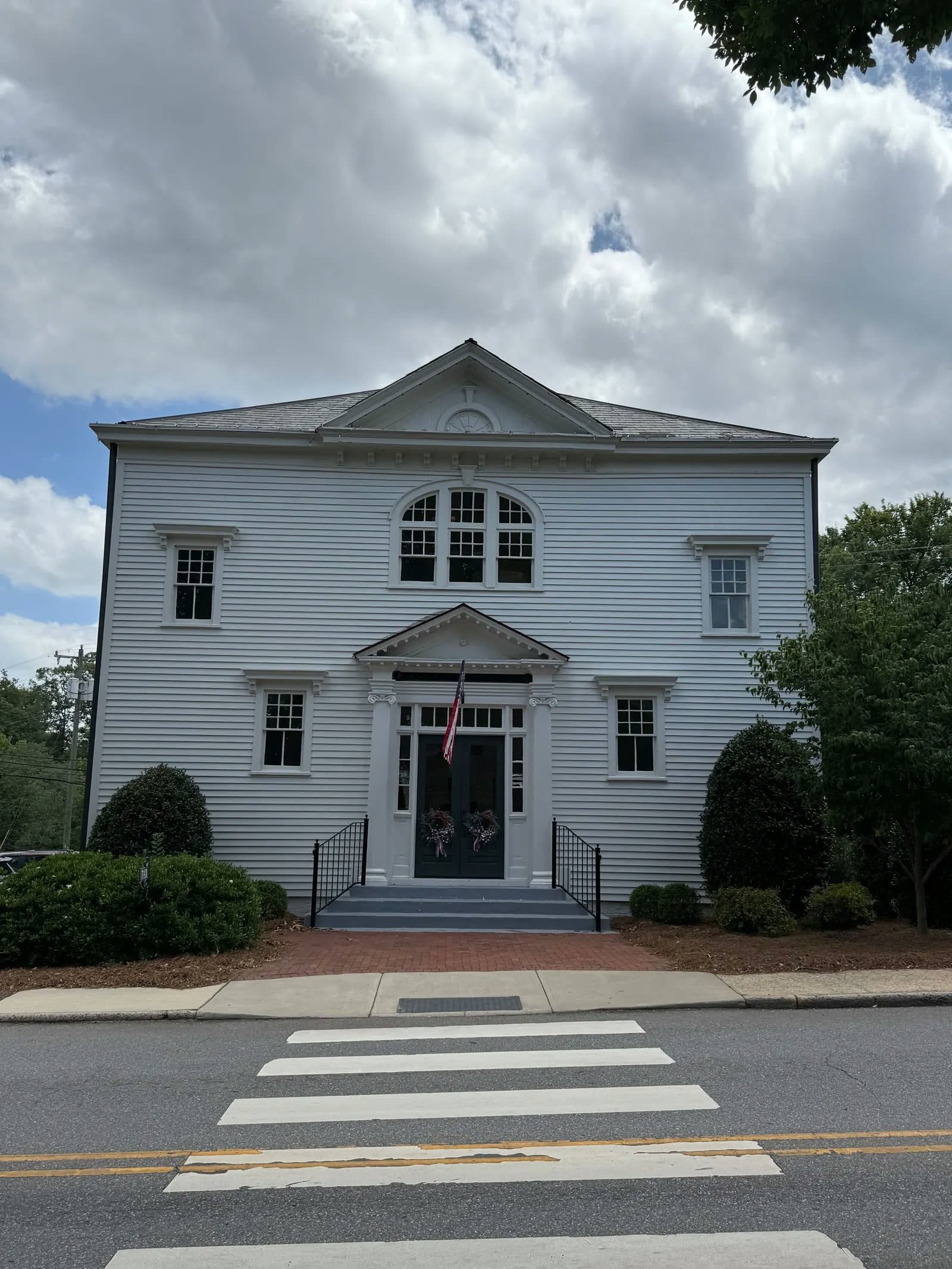 Historic white clapboard building on Main Street in McAdenville, NC